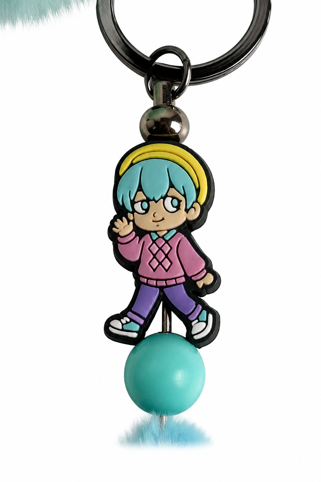 Porte-clés pompon turquoise avec figurine baby saja