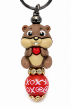 Porte-clés pompon beige avec hamster cœur