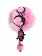 Porte-clés pompon rose avec figurine mira