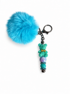 Porte-clés pompon turquoise avec ourson fleuri