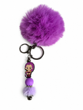 Porte-clés pompon violet avec figurine rumi